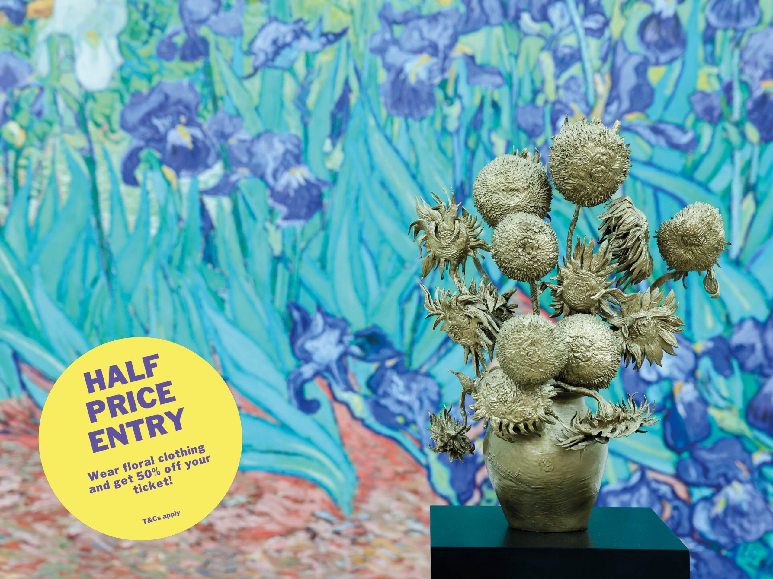Bronze Sunflowers sculpture in front of a Van Gogh iris painting. A flash says 'Half Price Entry'.